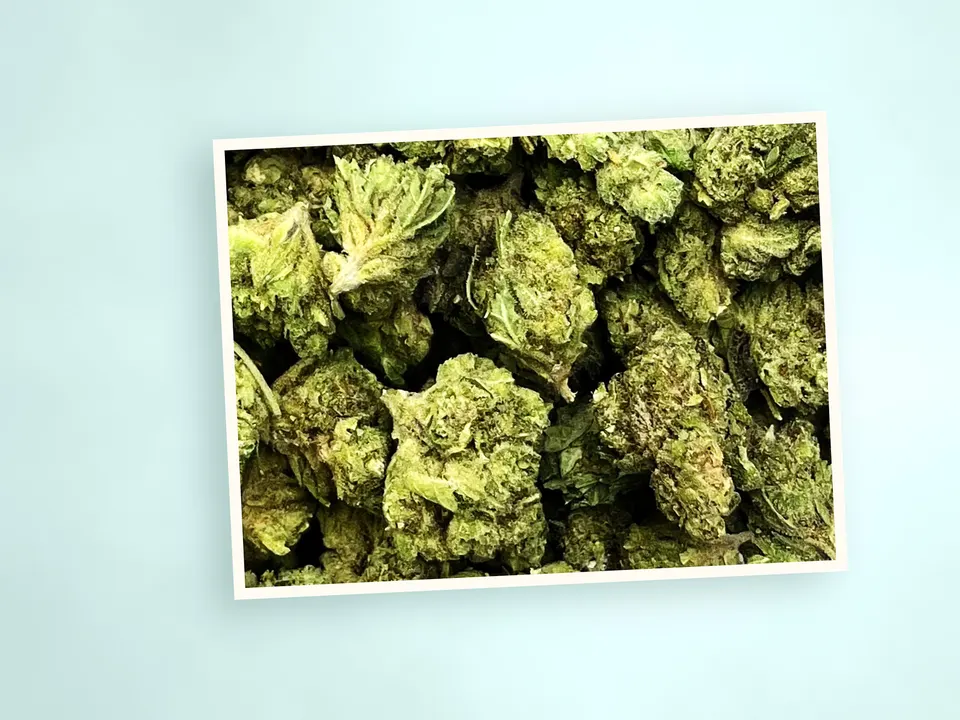 Jelly Roll smalls THCA flower on a painted plank