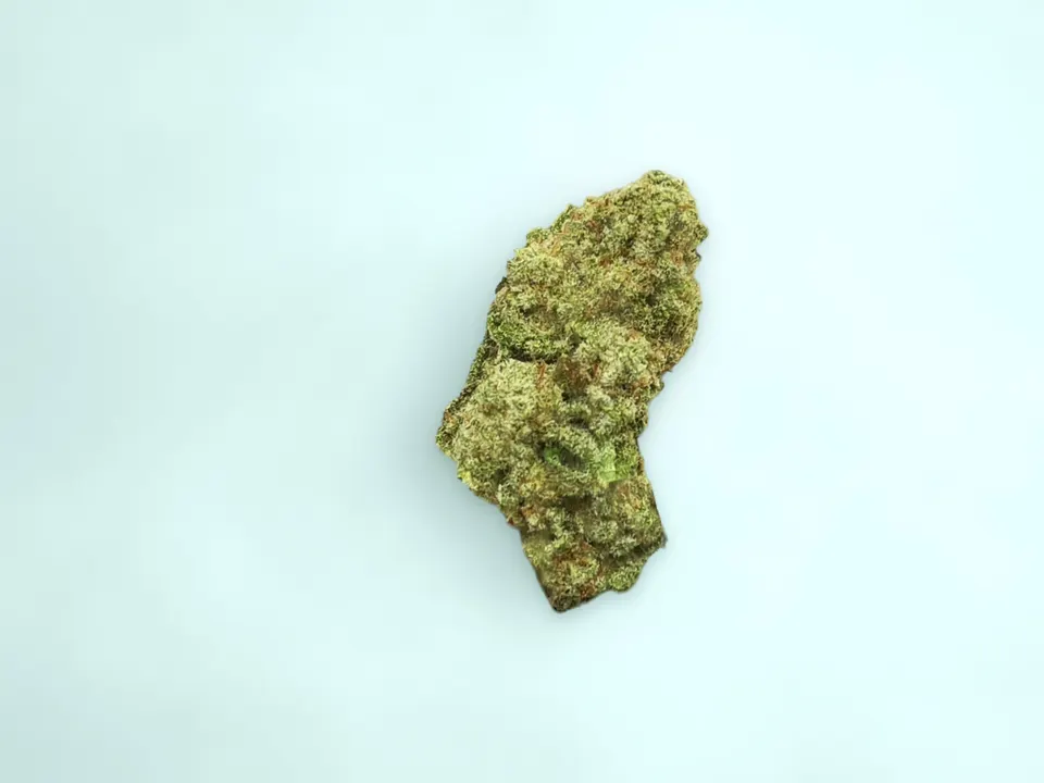 Papaya Punch greenhouse THCA flower on a painted plank